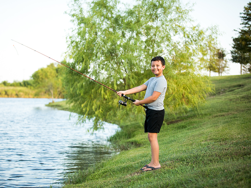 Boy Fishing in Edgewater Community Near League City, TX